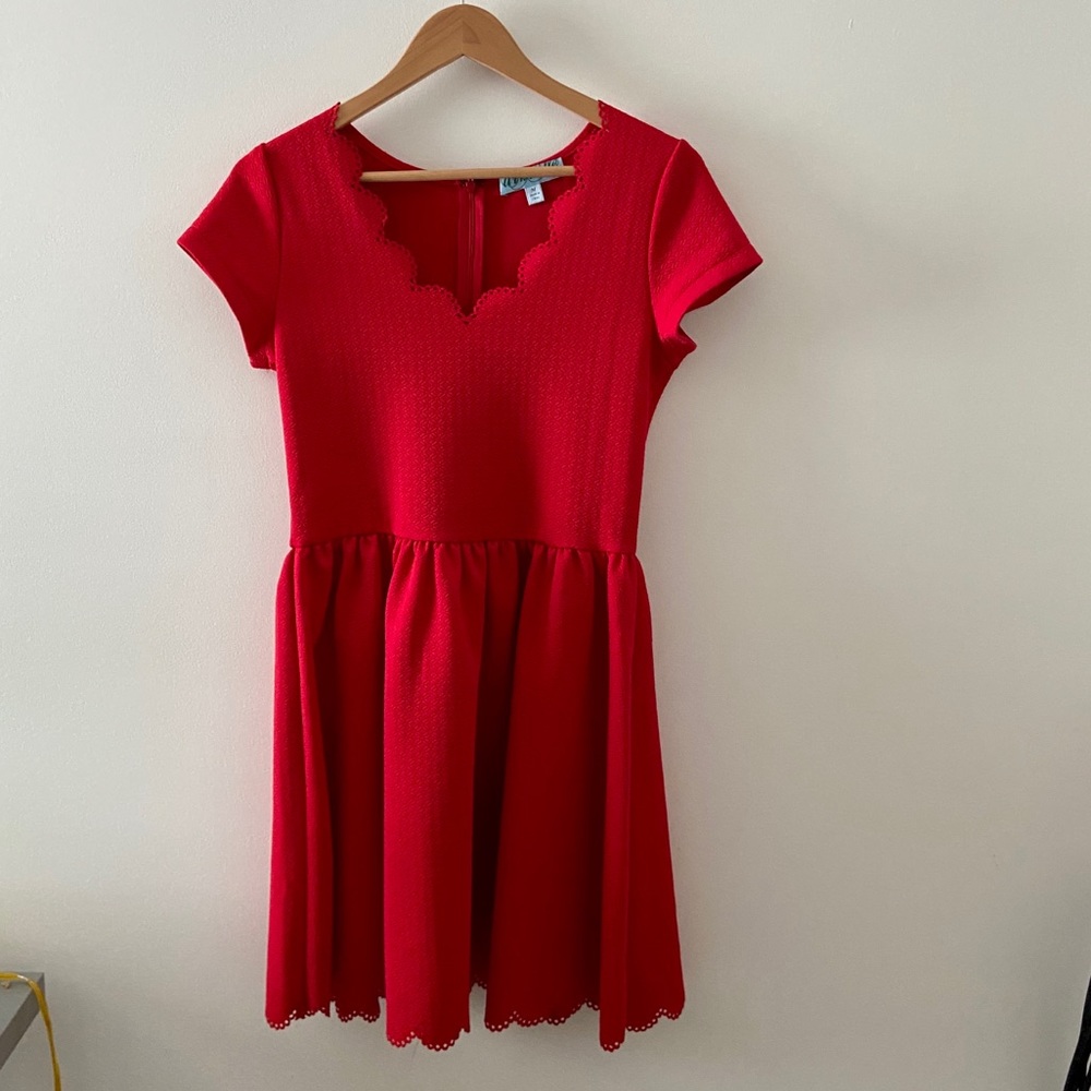 Little red dress with eyelet neckline
